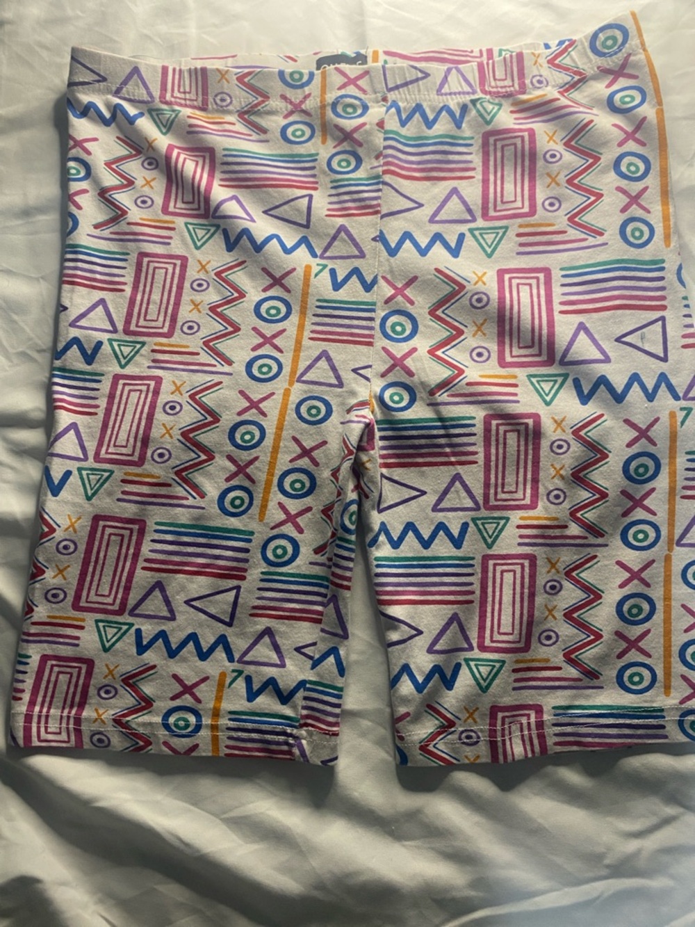 On Fire White Biker Shorts with Multicolor Geometric Print